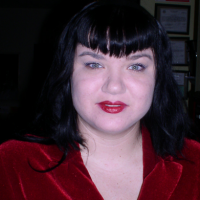 Rosalie Hansen Woman with black hair and porcelain skin